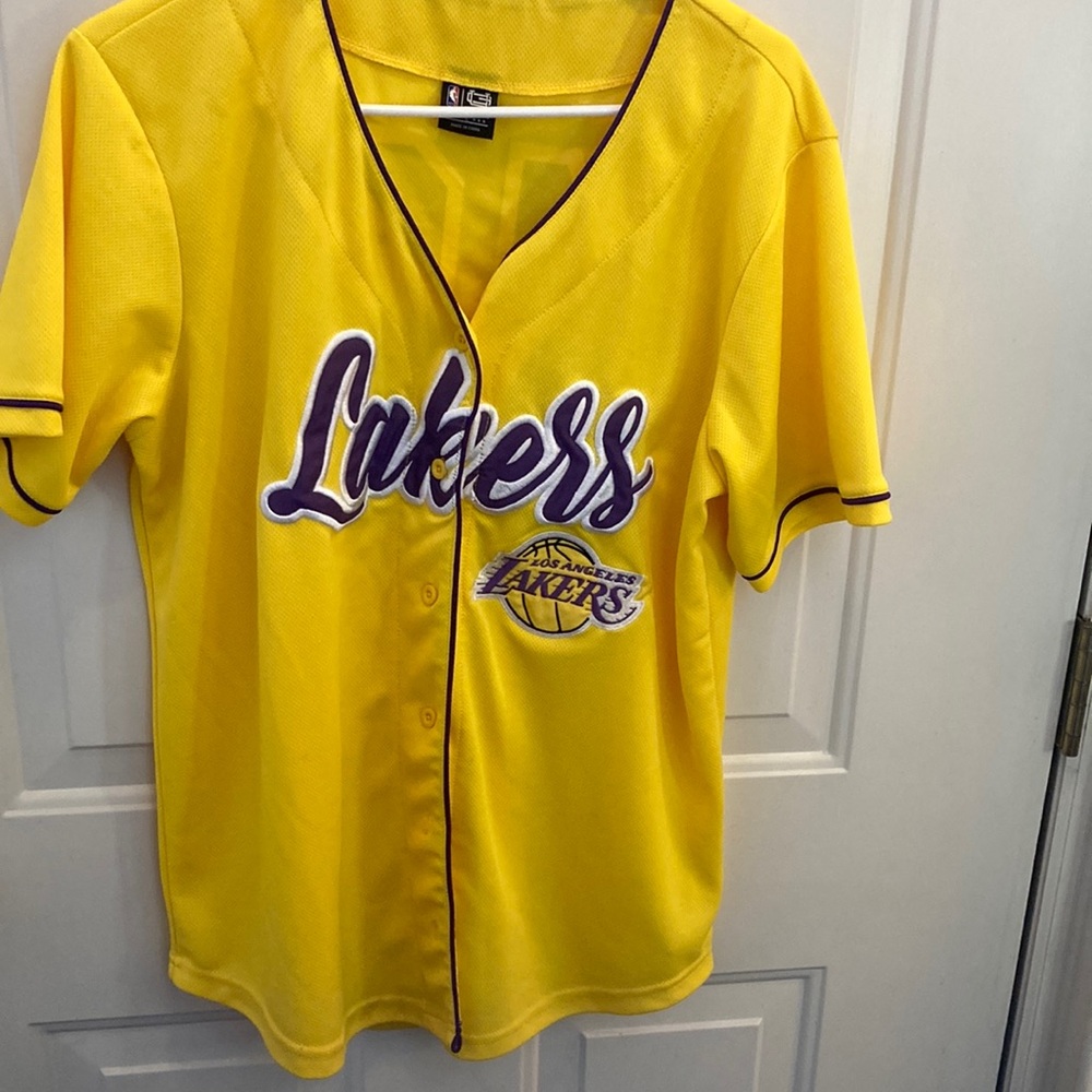 Yellow/Purple  L.A. Lakers #48 LeBron meshed short sleeved Size large Jersey.